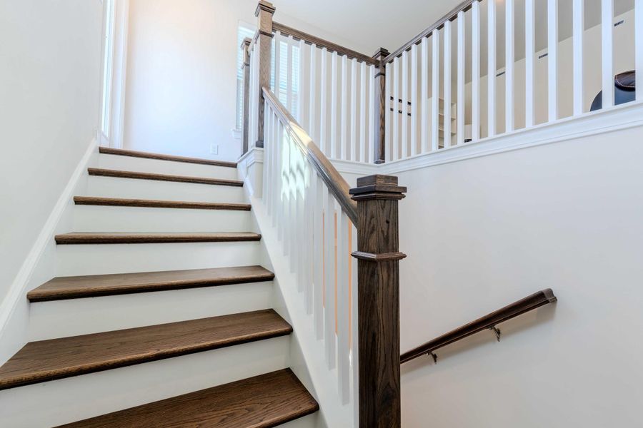 Spacious, unfurnished interior of a new home in Jasmine Point at Lakes of Cane Bay, Summerville (Image 25).