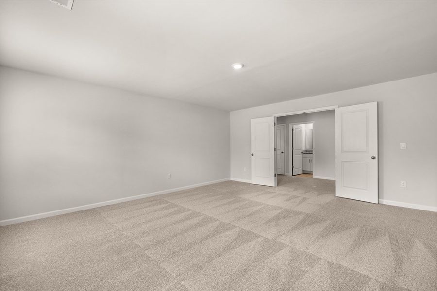 Representative unfurnished interior of a home built from the Mansfield by D.R. Horton in Southwind Village, Evans (Image 33).