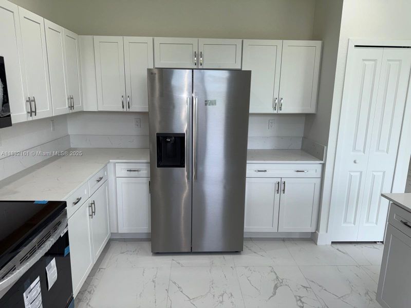 Furnished interior view inside a new home in , Homestead (Image 8). Furnished interior view inside a new home in , Homestead (Image 8).