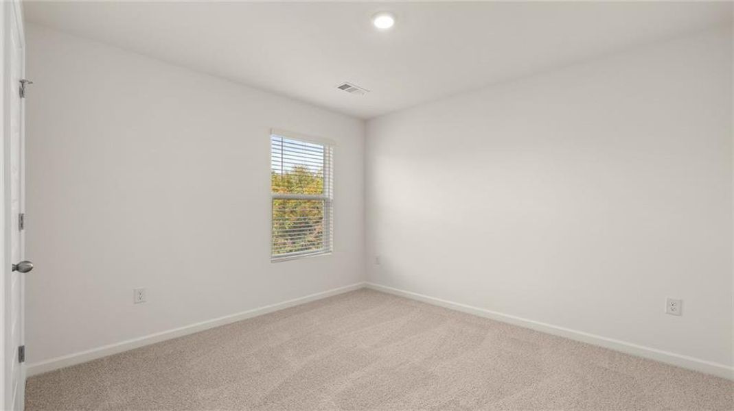 Spacious, unfurnished interior of a new home in Brooks Station, Dacula (Image 25).