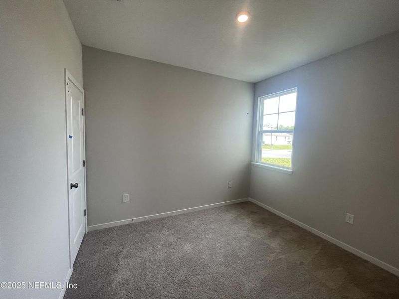 Spacious, unfurnished interior of a new home in Palm Series at Seminole Palms, Palm Coast (Image 19).