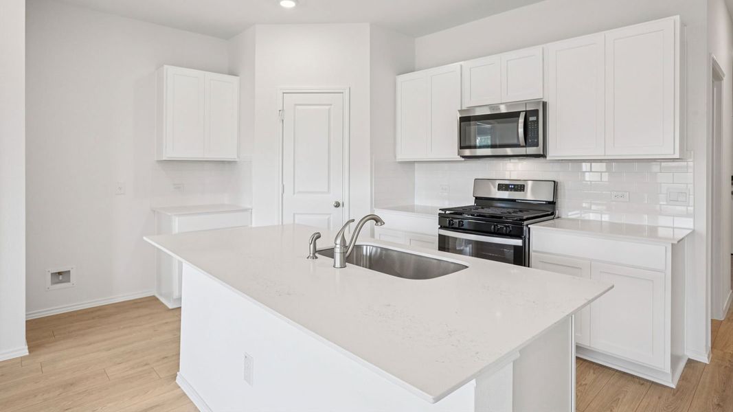 Furnished interior view inside a new home in Carillon, Manor (Image 5).