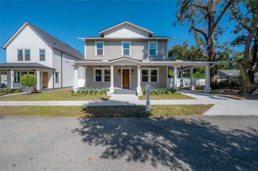 Front exterior of a new home in , Tampa, FL, highlighting curb appeal (Image 26). Front exterior of a new home in , Tampa, FL, highlighting curb appeal (Image 26).