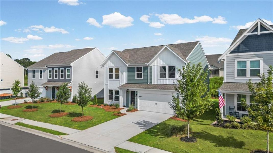 Front exterior of a new home in Twin Lakes, Hoschton, GA, highlighting curb appeal (Image 17).