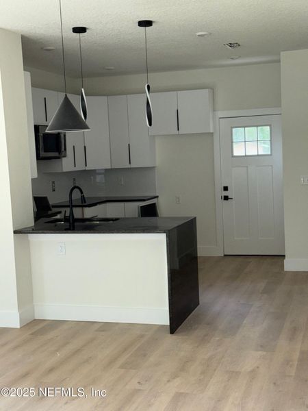 Furnished interior view inside a new home in , Jacksonville (Image 3).