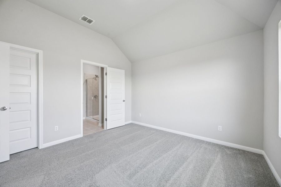 Primary Suite in the Pine home plan by Trophy Signature Homes - REPRESENTATIVE PHOTO