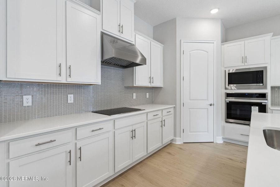 Furnished interior view inside a new home in Sandy Ridge, Yulee (Image 8).