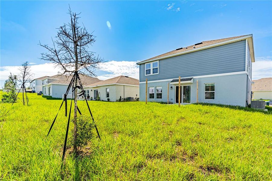 Exterior details and patio area of a home in Cascades: Grand Collection, Davenport (Image 2).