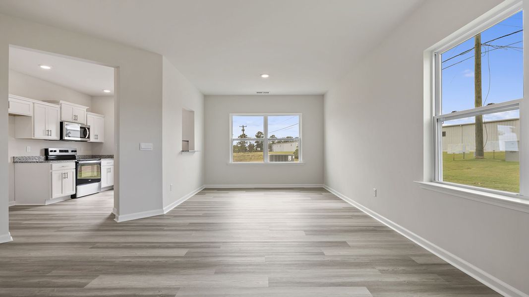 Spacious, unfurnished interior of a new home in Tanglewood Townes, Greenville (Image 15).