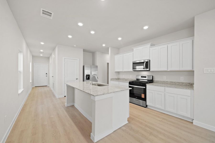 Furnished interior view inside a new home in Riverwood Ranch, Angleton (Image 7).
