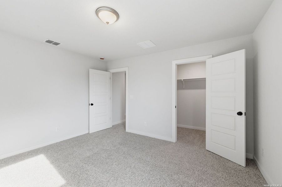 Spacious, unfurnished interior of a new home in The Meadows at Hunters Ranch, San Antonio (Image 29).