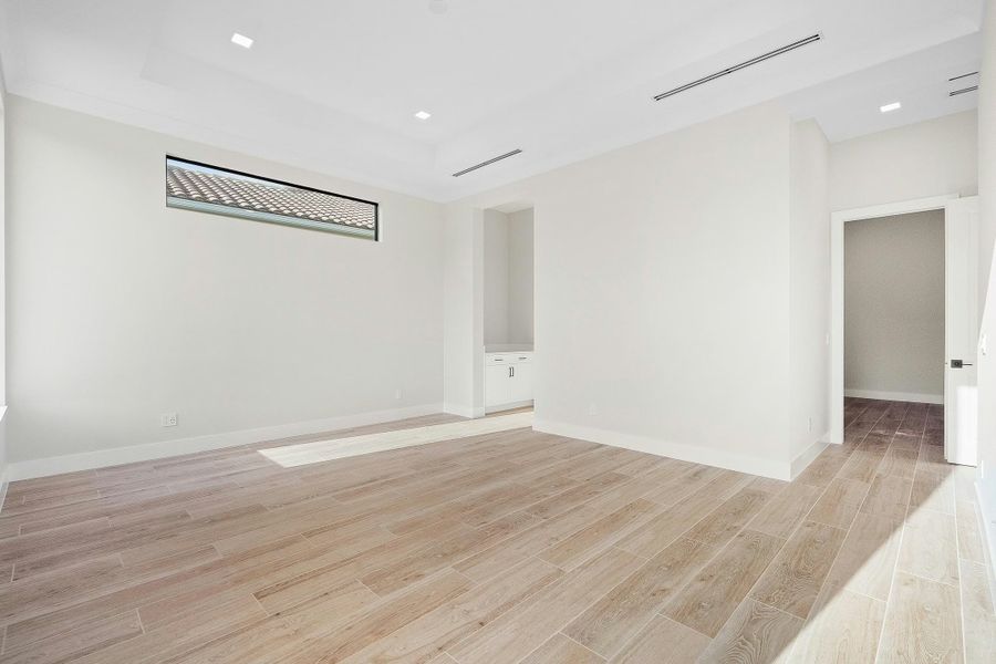 Representative unfurnished interior of a home built from the Alessia 58 by GHO Homes in Tesoro Club, Port St. Lucie (Image 34).