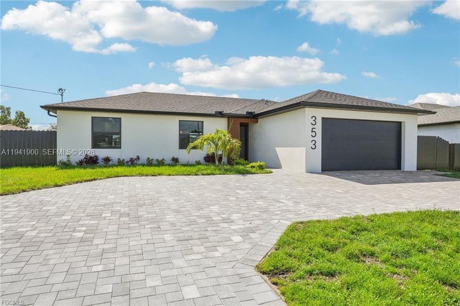 Front exterior of a new home in , Cape Coral, FL, highlighting curb appeal (Image 19).