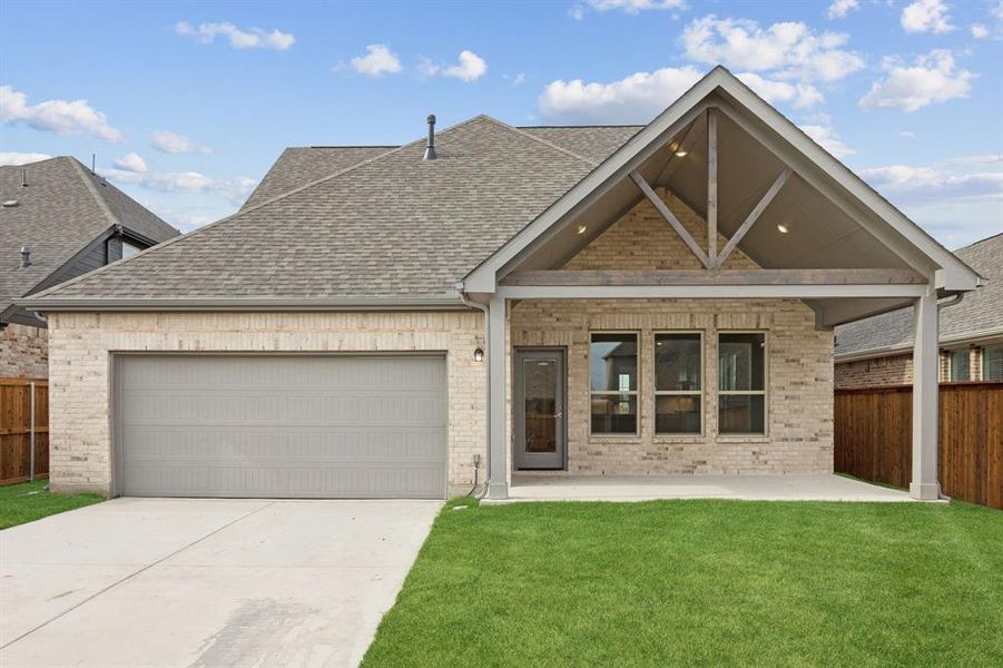 Front exterior of a new home in Dove Hollow, Waxahachie, TX, highlighting curb appeal (Image 21).