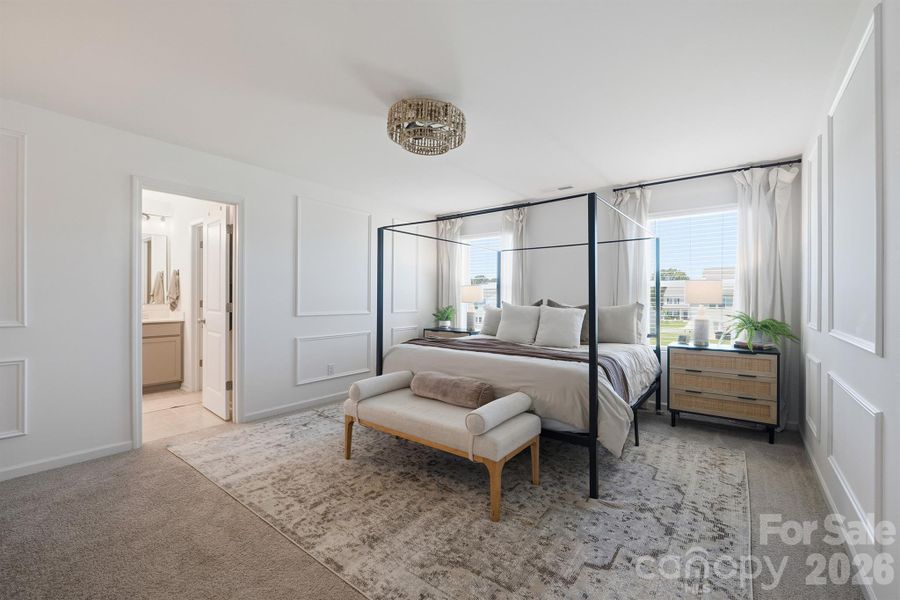 Large primary suite with lots of natural light