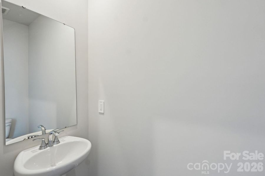 Photo is not of the actual home, but is an inspirational photo of builder’s model home and may depict options, furnishings, and/or decorator features that are not included