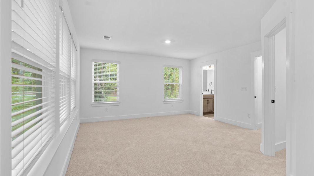 Accomplished design meets restful elegance in this exclusive primary suite by DRB Homes Accomplished design meets restful elegance in this exclusive primary suite by DRB Homes