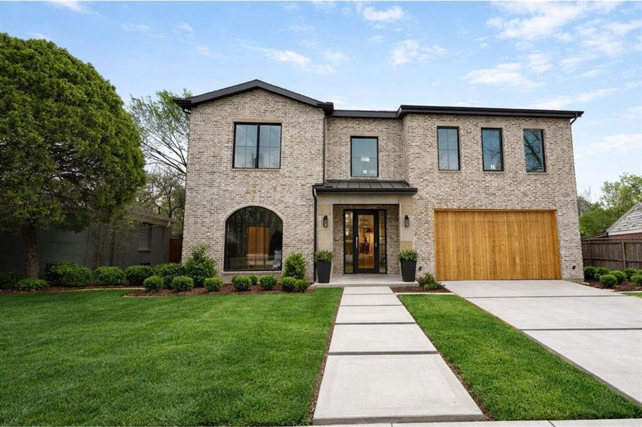 Front exterior of a new home in , Dallas, TX, highlighting curb appeal (Image 1). Front exterior of a new home in , Dallas, TX, highlighting curb appeal (Image 1).