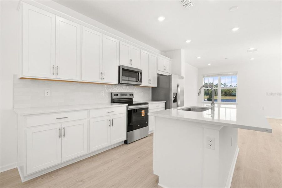 Furnished interior view inside a new home in Serenade at Ovation, Winter Garden (Image 7). Furnished interior view inside a new home in Serenade at Ovation, Winter Garden (Image 7).