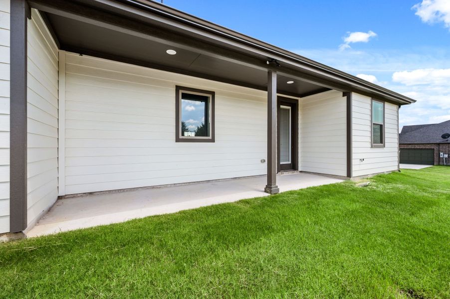 Front exterior of a new home in Saddleback Estates, Boyd, TX, highlighting curb appeal (Image 21).
