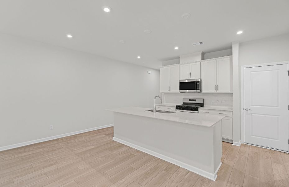 Furnished interior view inside a new home in Ansley Towns, Cumming (Image 14).