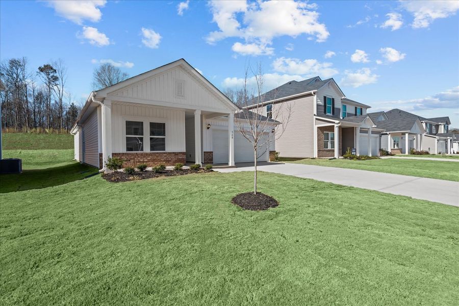 Front exterior of a new home in Creek Ridge - Signature Collection, Spartanburg, SC, highlighting curb appeal (Image 2). Front exterior of a new home in Creek Ridge - Signature Collection, Spartanburg, SC, highlighting curb appeal (Image 2).