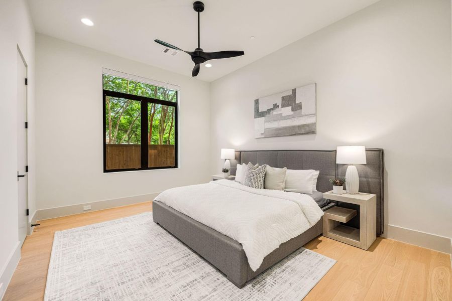 [JUNIOR SUITE-1ST FLR] Designed for comfort and convenience, the first-floor junior suite offers a spacious bedroom with beautiful natural light, making it ideal for guests or in-laws.