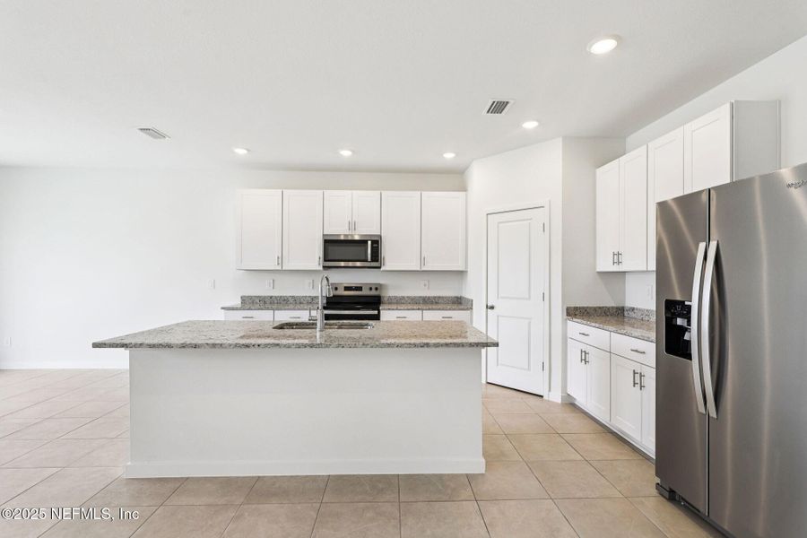 Furnished interior view inside a new home in Lakes at Bella Lago - Signature Series, Green Cove Springs (Image 5).
