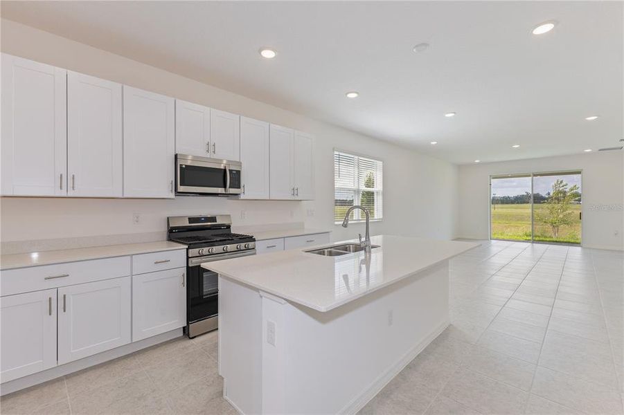 Furnished interior view inside a new home in Highfield at Twisted Oaks, Wildwood (Image 3).