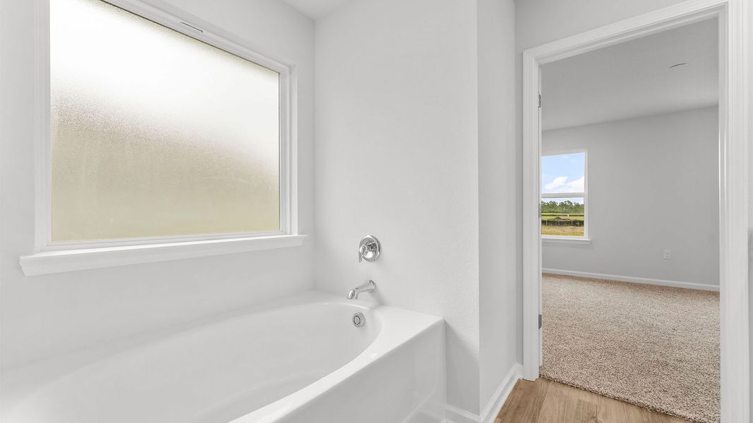 Representative furnished interior of a home built from the The Celeste by D.R. Horton in Morningside, Panama City (Image 10).