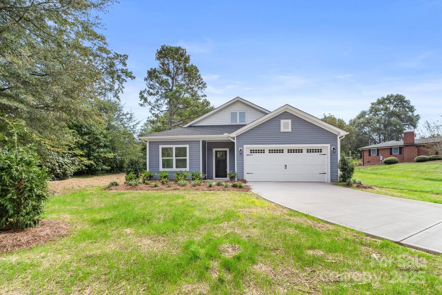 Front exterior of a new home in , Cherryville, NC, highlighting curb appeal (Image 2). Front exterior of a new home in , Cherryville, NC, highlighting curb appeal (Image 2).