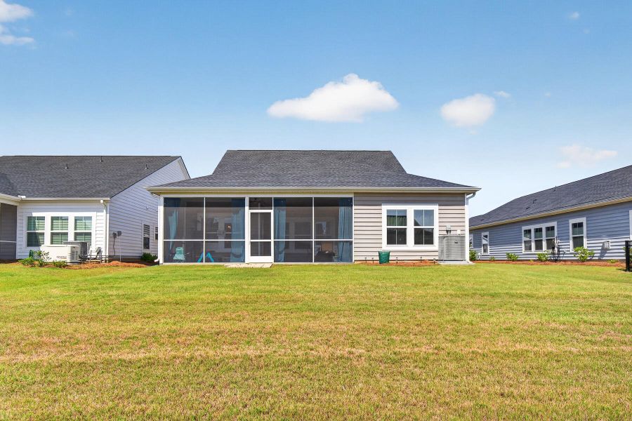 Exterior details and patio area of a home in Horizons at Summers Corner | 55+, Summerville (Image 28).