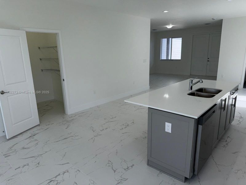 Furnished interior view inside a new home in , Homestead (Image 4). Furnished interior view inside a new home in , Homestead (Image 4).