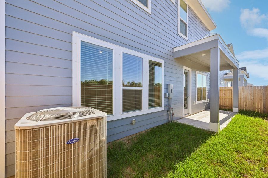 Exterior details and patio area of a home in Kemah Crossing - Luxe Series, Kemah (Image 3).