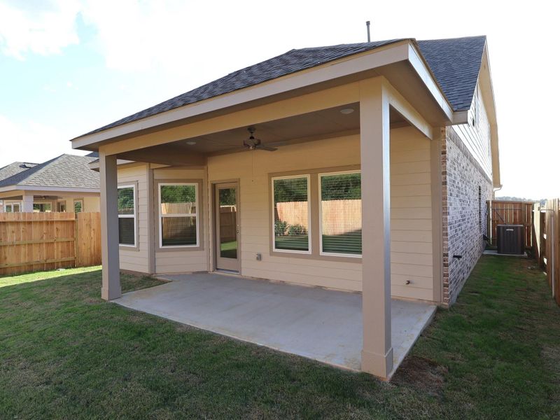 Exterior details and patio area of a home in Sorella, Tomball (Image 9).