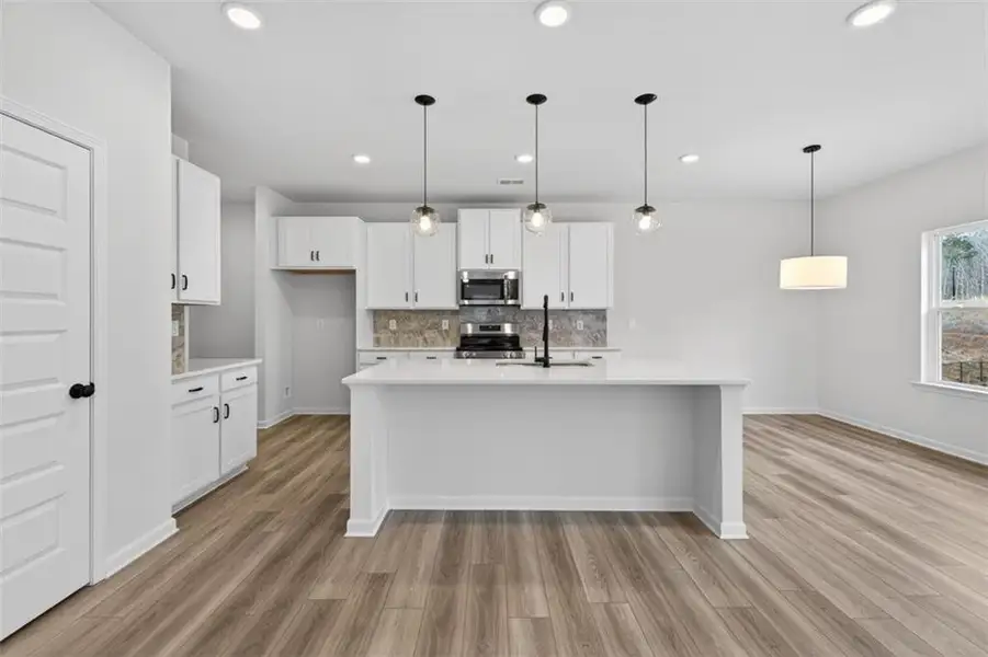 Furnished interior view inside a new home in Allen Manor, Hoschton (Image 7).