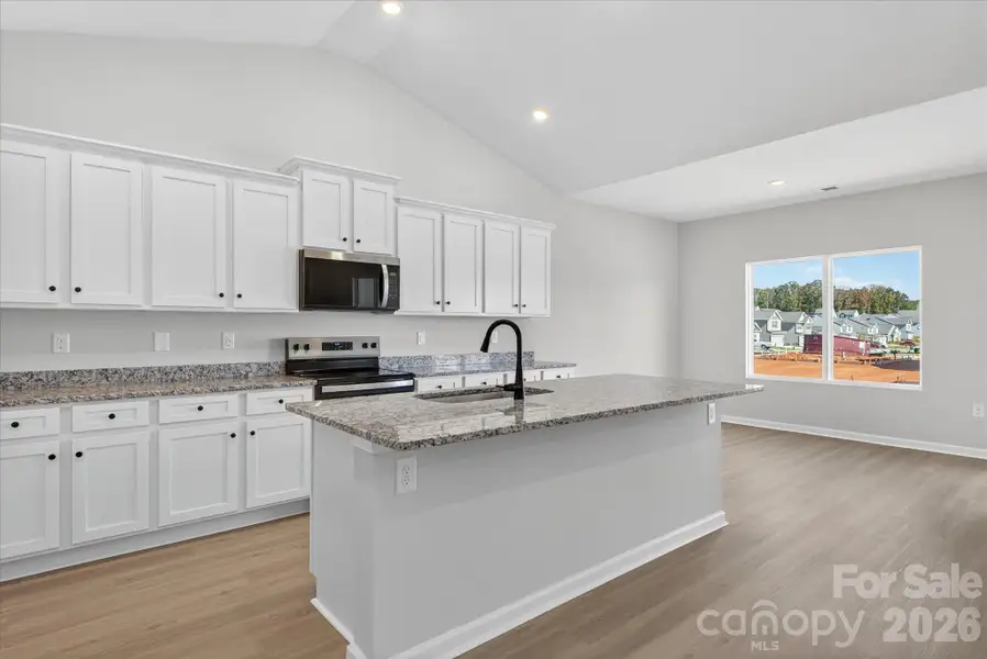 Furnished interior view inside a new home in Stagecoach Station, Gastonia (Image 4).
