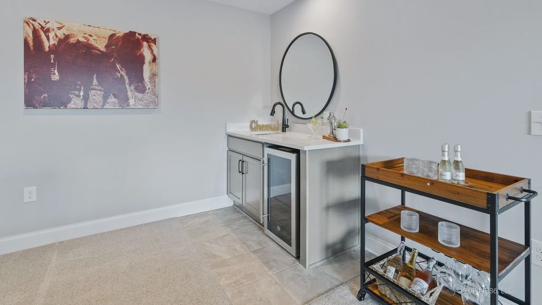 Representative furnished interior of a home built from the Cambridge by Epcon Communities in The Courtyards at Oak Grove, Durham (Image 31).