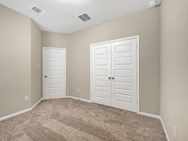 Spacious, unfurnished interior of a new home in Montgomery Oaks - Premier, Conroe (Image 26).