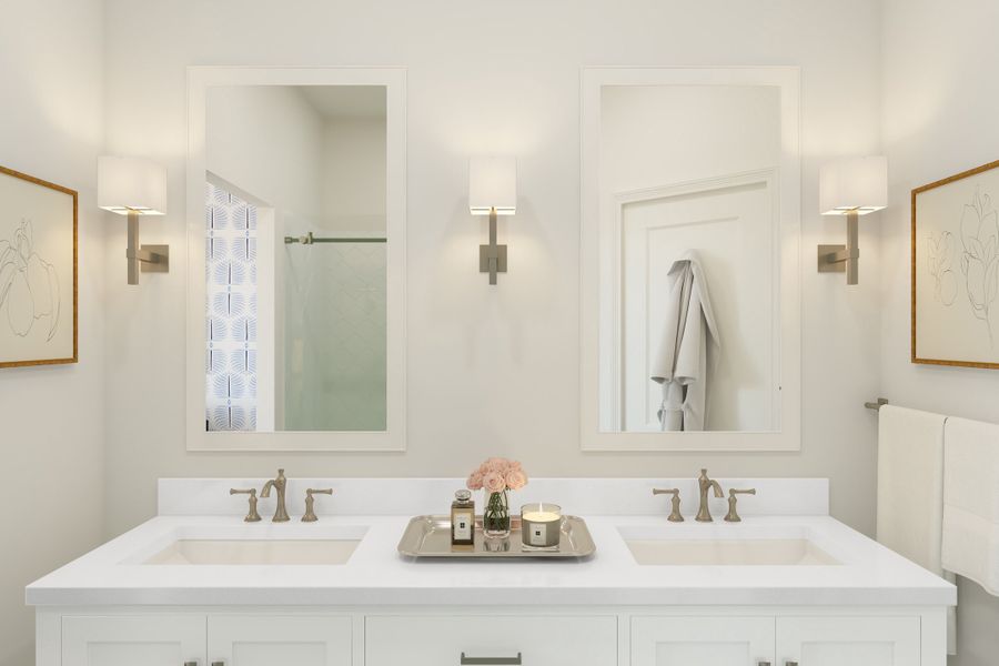 Primary bath with white-framed mirrors Primary bath with white-framed mirrors