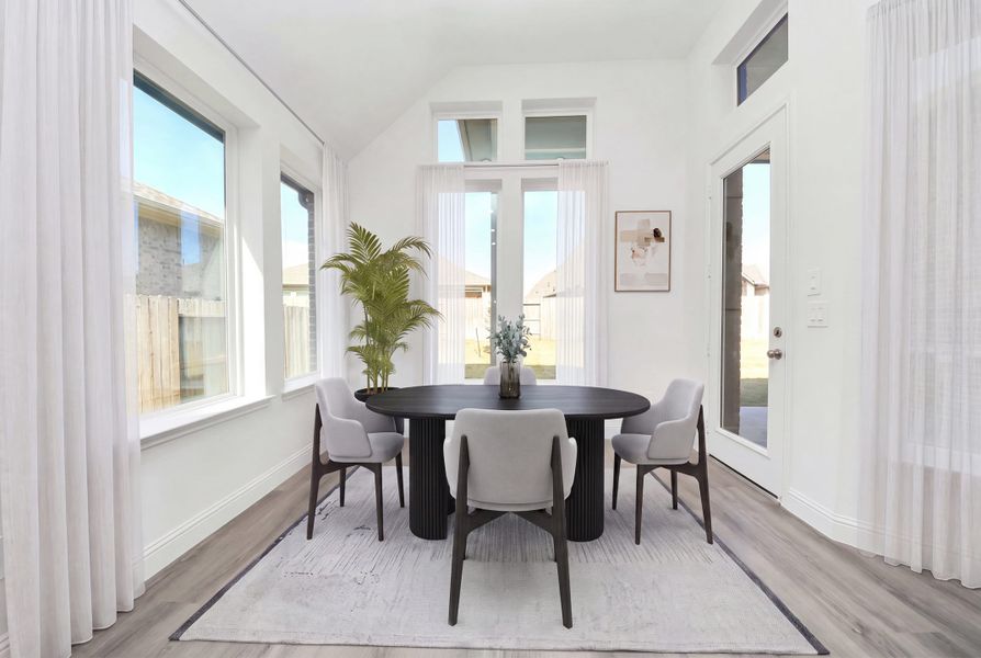 Furnished interior view inside a new home in ARTAVIA, Conroe (Image 8).