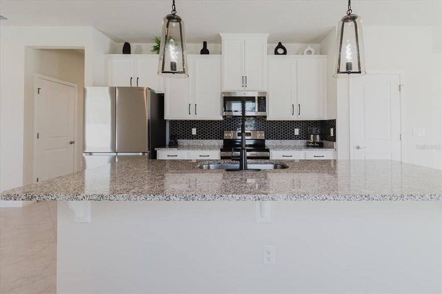 Furnished interior view inside a new home in Conner Crossing, Spring Hill (Image 9).