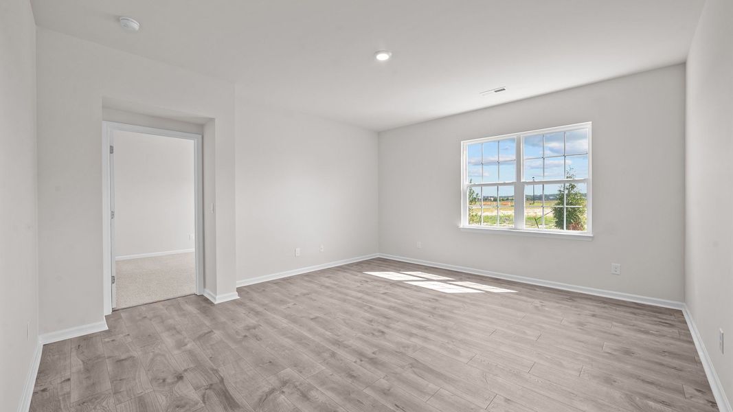 Spacious, unfurnished interior of a new home in Ridgewood Farms, Winterville (Image 13).