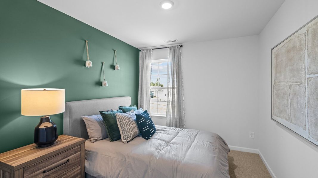 Furnished interior view inside a new home in The Townes at Ridgewood Farms, Winterville (Image 17).