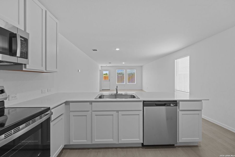 Furnished interior view inside a new home in Guadalupe Ridge, New Braunfels (Image 4).