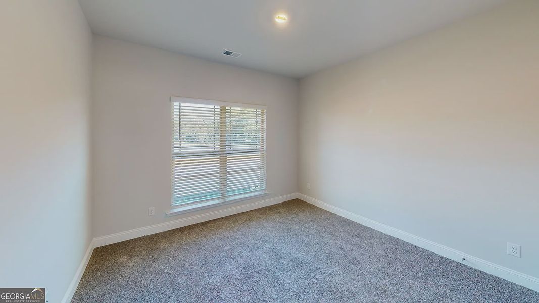 Spacious, unfurnished interior of a new home in Holliday Pass, Griffin (Image 14).