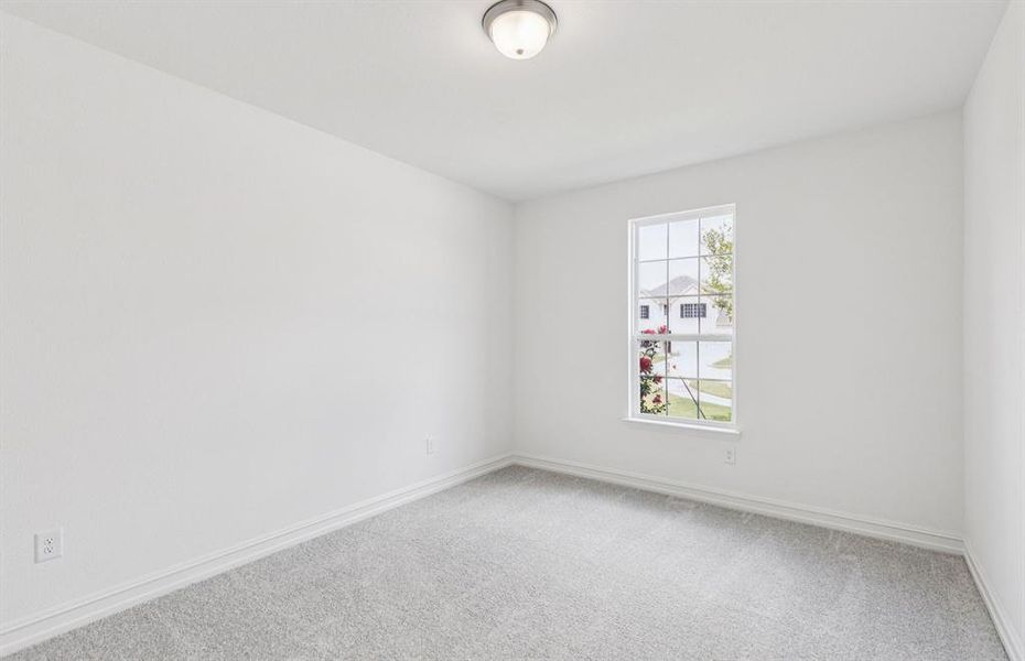 Spacious secondary bedroom with ample closet space Spacious secondary bedroom with ample closet space