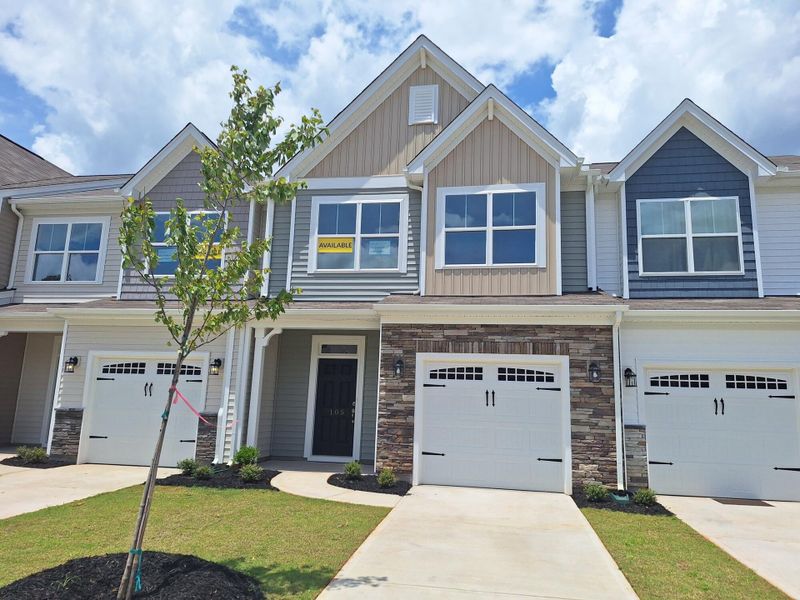 Front exterior of a home in the Attenborough Townhomes community, located in Piedmont, SC (Image 2).