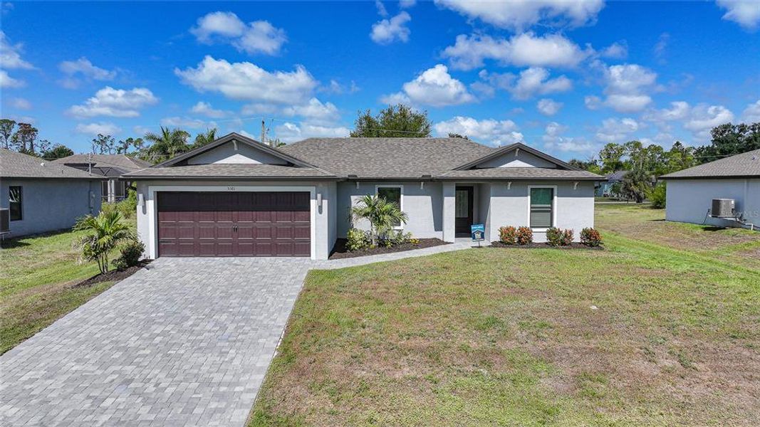 Front exterior of a new home in , Port Charlotte, FL, highlighting curb appeal (Image 27).