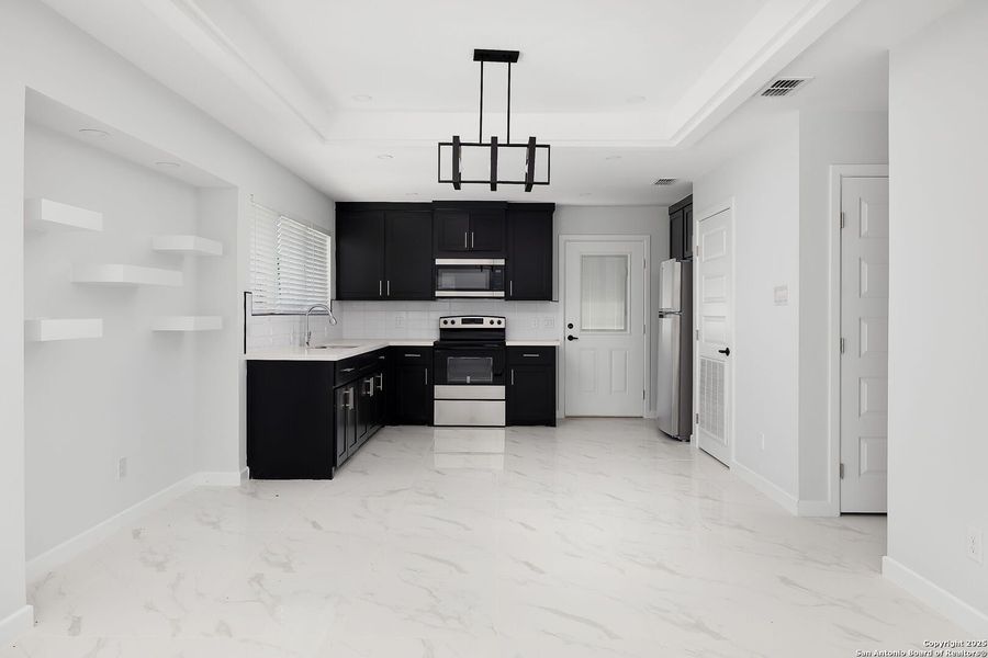 Furnished interior view inside a new home in , Weslaco (Image 6).